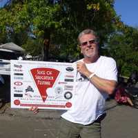 <p>Matthew Mandell of the Westport Weston Chamber of Commerce reminds residents of the upcoming Slice of Saugatuck Festival.</p>