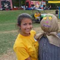 <p>Scarecrow building is always a popular booth at the fair. </p>