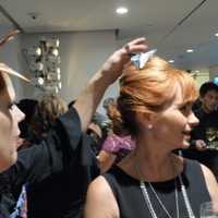 <p>An orgami butterfly is placed in the hair of Ringwood resident Elizabeth Jennings, of MagnaCare. </p>