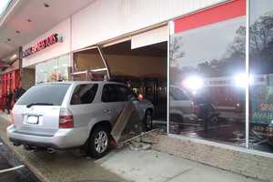SUV Slams Into Storefront In Westport