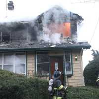 <p>Firefighters had to go to exterior operations at the West Harwood Terrace blaze in Palisades Park.</p>