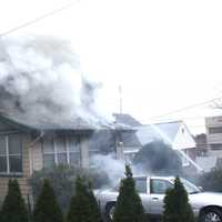 <p>Responders were met by heavy fire and smoke at the West Harwood Terrace home in Palisades Park.</p>