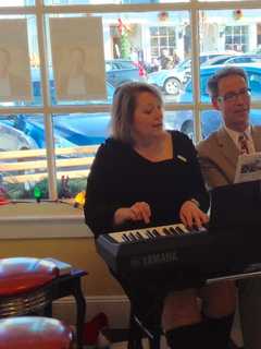 Ridgefield Symphony Orchestra Performs At Sweet Shop During Holiday Stroll