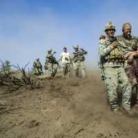 <p>October 2007. American soldiers assist one of their own to a medivac helicopter in the Korengal Valley in Afghanistan after a Taliban ambush.</p>