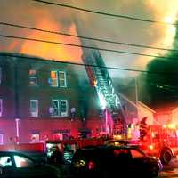 <p>Gas initially fed the flames that raced up through the building on Hamilton Avenue in Passaic.</p>