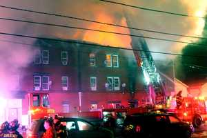 PHOTOS: Gas-Fed Fire Destroys Multi-Family, Mixed-Use Building In Passaic, Dozens Displaced