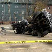 <p>A cement truck driver was injured when his truck fell through a parking lot in Fairfield County.</p>