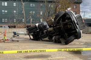 Person Injured After Cement Mixer Falls Through Parking Lot Deck In Fairfield County