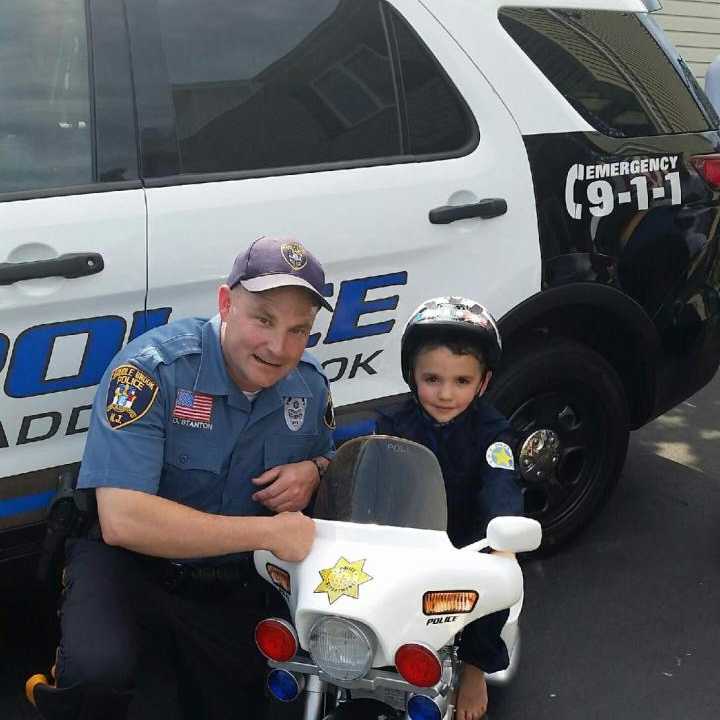 Officer Chris Stanton helped Andrew, 4, celebrate his birthday