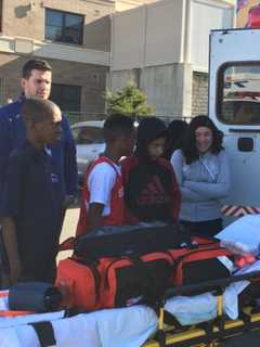 Peekskill Middle School Students Visit With EMS Workers