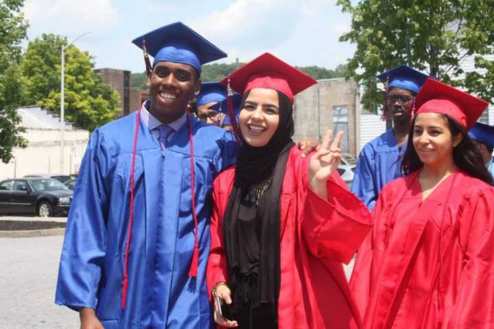 Peekskill High School graduates accepted their diplomas on Sunday at Paramount Hudson Valley.