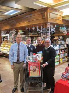 Pelham Group, Supermarket Chain Distribute Holiday Food Baskets To Needy