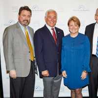 <p>Left to Right: Board Vice Chairman Peter Rugen, emcee Bobby Valentine, Diane Bosek and Board Chairman Jim Bosek.</p>