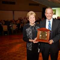 <p>Board Chair Jim Bosek (of Darien) presented Patricia Phillips (of Stamford) with the Rays of Hope Award. Phillips co-founded the shelter nearly 35 years ago.</p>