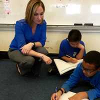 <p>Jeannine Babino in class with her students.</p>