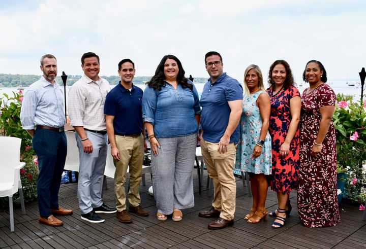 From left, Michael Farina, John Pardue, Daniel Moy, Erica Giglio Pac, Robert LoCastro, Jessica Bader, Alba Gallegos, Carla Pimentel