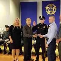 <p>Investigator Recruit Eric Giannatonio taking the oath of office.</p>