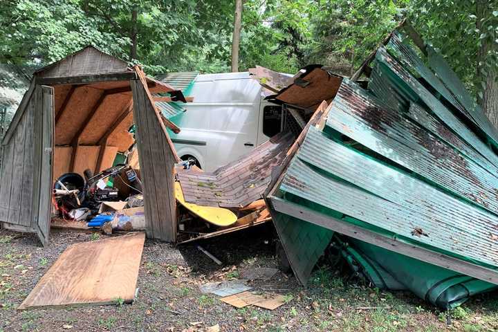 Cargo Van Barrels Off Route 208, Slams Into Backyard Storage Shed