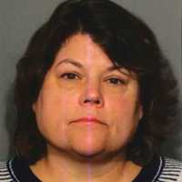 Woman Charged After Driving On Sidewalk In New Canaan To Try To Catch Dog, Police Say