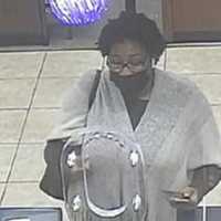 Police Search For Woman Accused Of Using Stolen Card To Withdraw $12K In Suffolk County