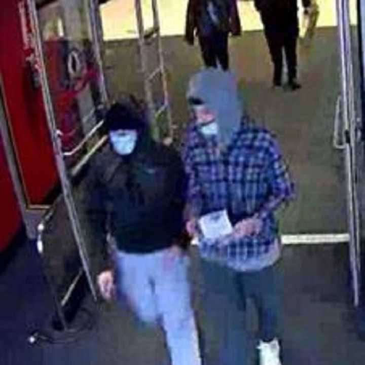 Police have asked the public for help identifying two people accused of using a stolen credit card at a Target on Long Island.