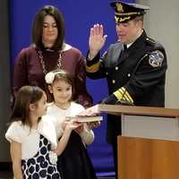 <p>Executive Undersheriff Vincent Quatrone is administered the oath of office by Judge Avis Bishop-Thompson</p>