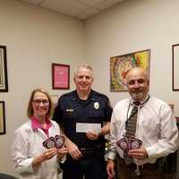 Norwalk Police Raise $3,330 For Breast Cancer Research