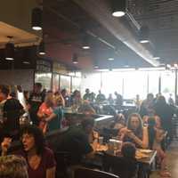 <p>The PizzaRev pre-grand opening on June 21.</p>