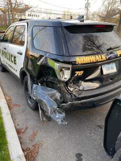 Car Strikes Police Cruisers, Causing One To Hit Norwalk Officer