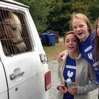 <p>Emmanuel’s teen parishioners, Grace Juneau, Lily Butt and Claire Magee, from left, at last year’s fair in Weston.</p>