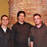 <p>Posto&#x27;s crew poses for a &quot;family&quot; shot. From left, they are: Sammy, Matt, Dino, and Patrick Amedeo, the owner.</p>