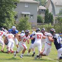 <p>Hasbrouck Heights quarterback Frank Quatrone looks for the endzone in the first half.</p>