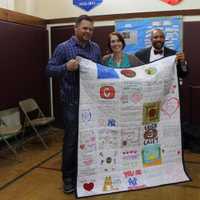 <p>Teachers from the Roosevelt and Claremont elementary schools designed and made a quilt for teacher William Casey,  a school baseball coach and Yankees fan who is battling cancer.</p>