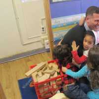 <p>Dutchess County Executive Marcus Molinaro reading to students at The Catharine Street Center during the 2016 event.</p>