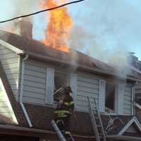 <p>An upstairs bedroom was fully involved when emergency responders arrived around 2:30 p.m.</p>