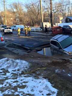 Motorist Crashes Into Hole After Driving Around Barrier In Rockland