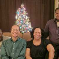 <p>Randy Jefferson (left) with his sons Richard and Ryan and wife Robin.</p>