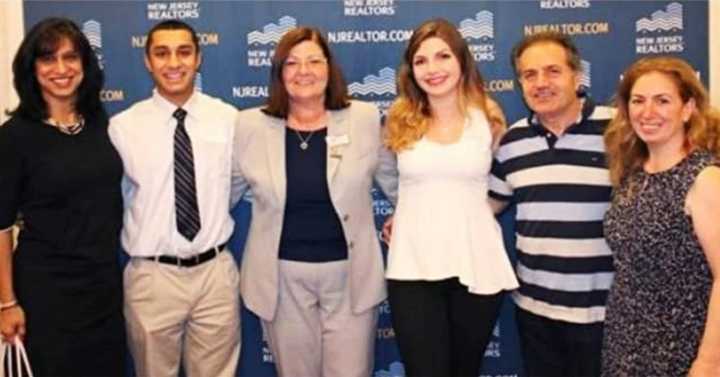 (from left) Rae Farapore with his mother, RealSource President Kathleen Houston and Rebecca Miksr Sahdi with her parents