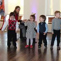 <p>Kids perform in a musical concert based on what they learned during class.</p>