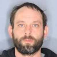 Man Armed With Rifles Apprehended After Threatening To Kill Troopers During Hours-Long Standoff