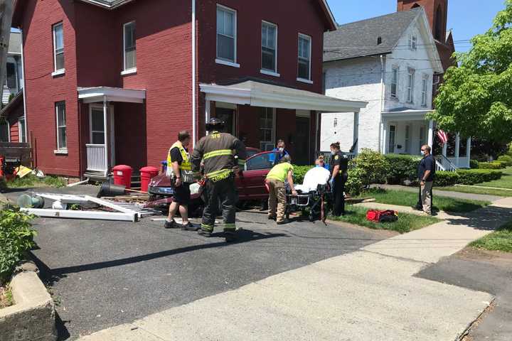 Woman Leaving Bank Drive-Thru Crashes Into Home, Police Say