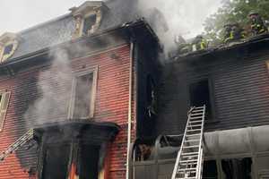 (DEVELOPING) Firefighters Battling Three-Story Home In Roxbury