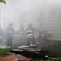 <p>Saddle Brook firefighters extinguished the 7 a.m. two-alarm blaze, which significantly damaged the 864-square-foot Hutter Street home.</p>