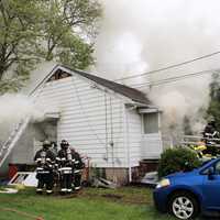 <p>Saddle Brook firefighters extinguished the 7 a.m. two-alarm blaze, which significantly damaged the 864-square-foot Hutter Street home.</p>