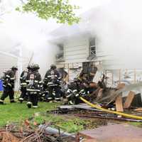 <p>Saddle Brook firefighters extinguished the 7 a.m. two-alarm blaze, which significantly damaged the 864-square-foot Hutter Street home.</p>