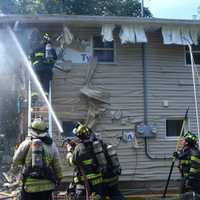 <p>The fire on Birk Street in Saddle Brook was officially declared under control shortly after 12:30 p.m., about 40 minutes after it began.</p>