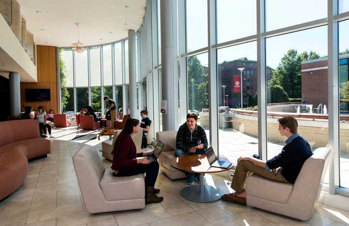 Students gather in the University Commons Atrium at Sacred Heart University in Fairfield.