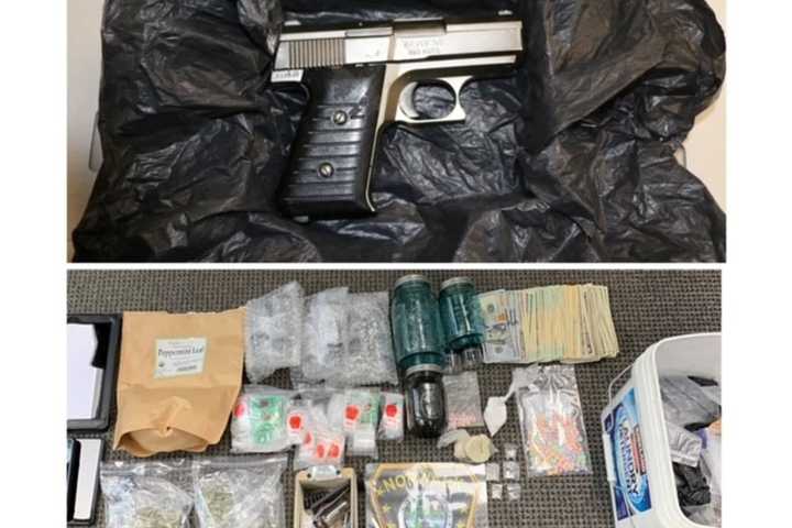 Handgun, Heroin Seized By Area Police