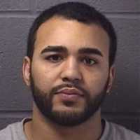 Suspect Caught With Guns, Cocaine Following Investigation In Area