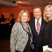 <p>Left to right: Sandi Mond and Gala Committee Chair Andrew M. Reid, both of Greenwich, with Natasha Muratov.</p>